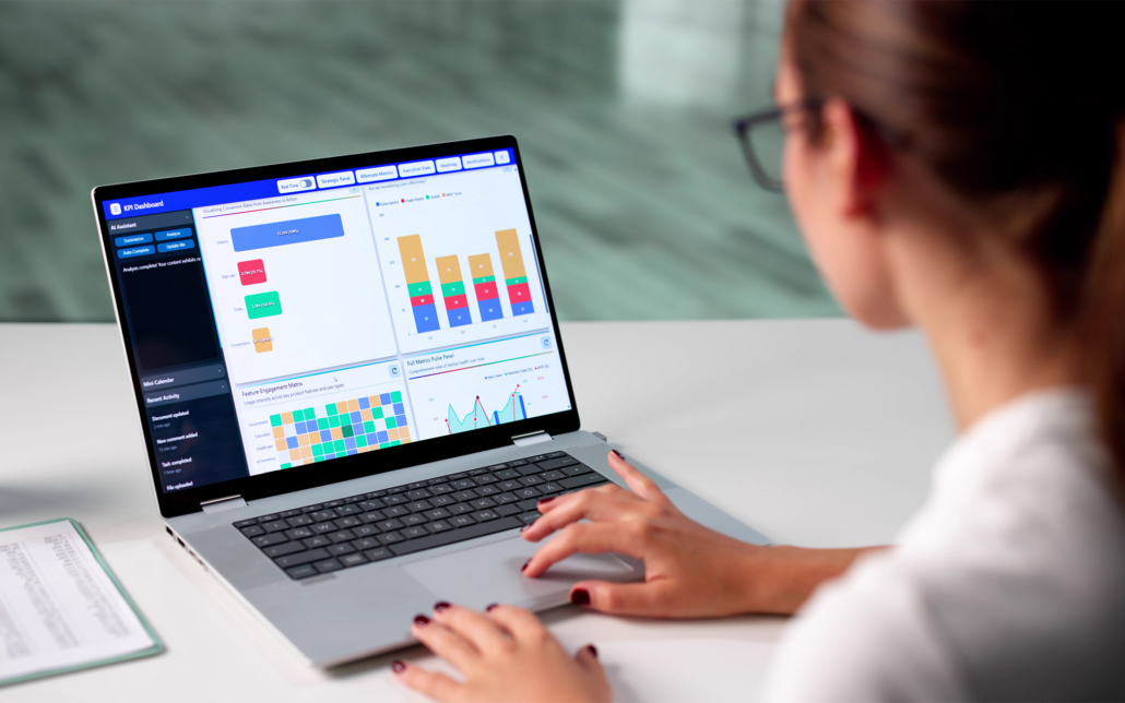 Worker Looking At Marketing Insights On Laptop